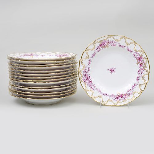 Set of Fifteen Continental Porcelain Puce Transfer Printed and Gilt-Decorated Soup Plates