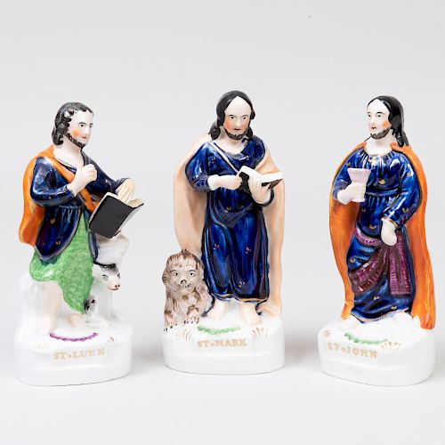Group of Three Staffordshire Pottery Flatback Figures of Evangelists