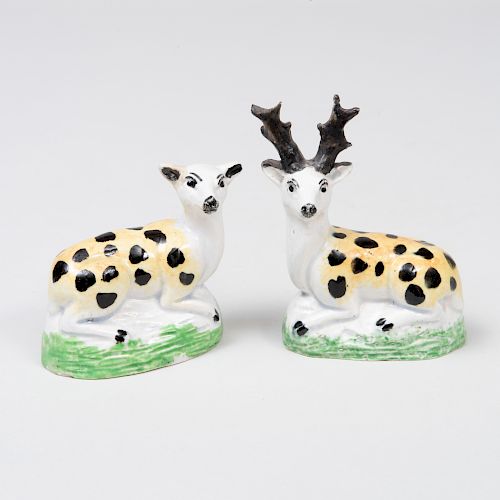 Pair of Staffordshire Pearlware Pottery Models of a Recumbent Stag and Doe