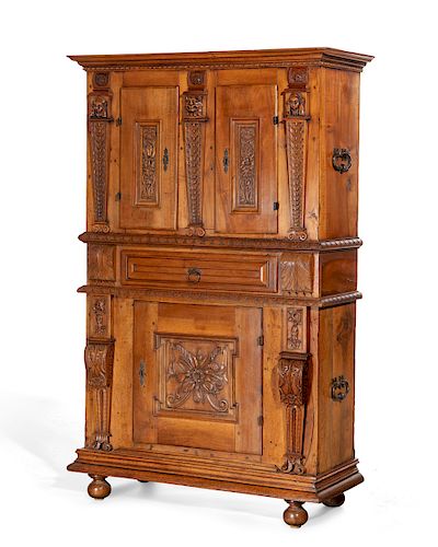 An Italian Baroque walnut side cupboard