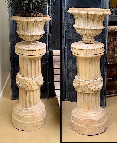 Pair of Composition Garden Urns on Fluted Pedestals