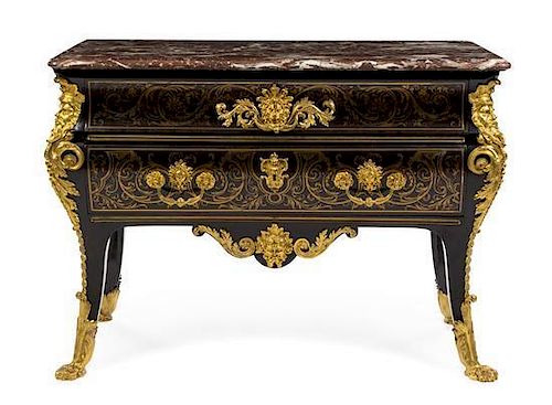 A Louis XV Gilt Bronze Mounted Ebony Commode Height 36 1/4 x width 50 1/2 x depth 23 7/8 inches.