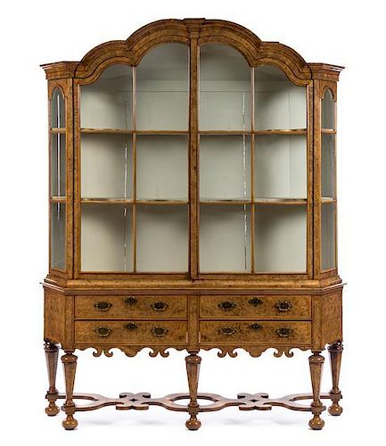 A Dutch Walnut Cabinet on Stand Height 91 x width 73 x depth 15 1/2 inches.