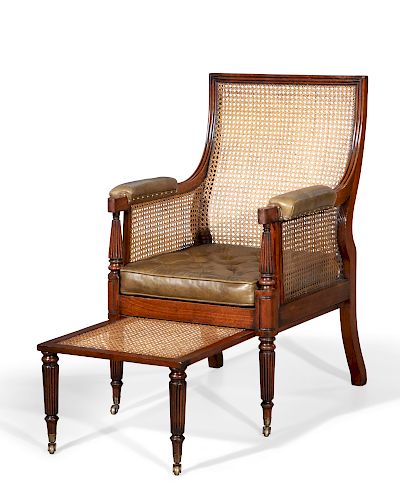A Regency mahogany bergere and foot stool