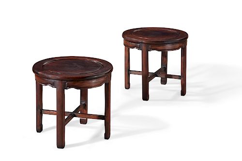 A pair of Chinese carved hardwood low tables