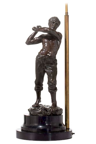 A French bronze figure of a miner, Gamboge