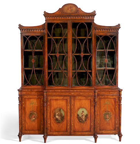 A Sheraton Revival painted satinwood bookcase