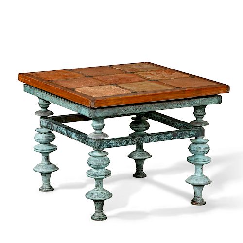 An Italian terracotta and verdigris bronze table