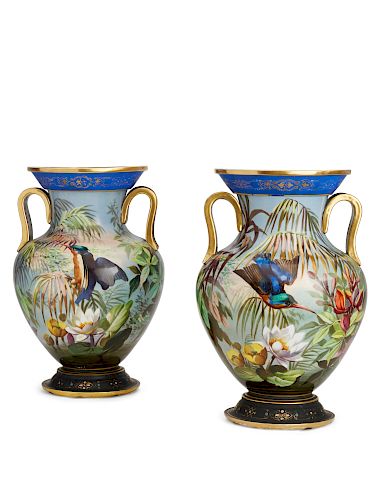 A pair of French porcelain two-handled vases