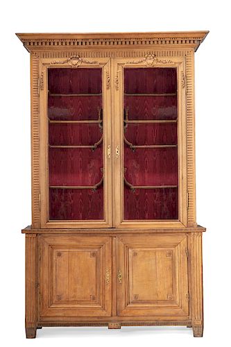 A French carved oak vitrine cabinet