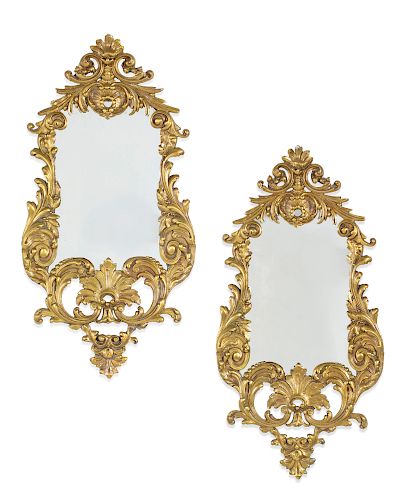A pair of Louis XV style gilt bronze mirrors