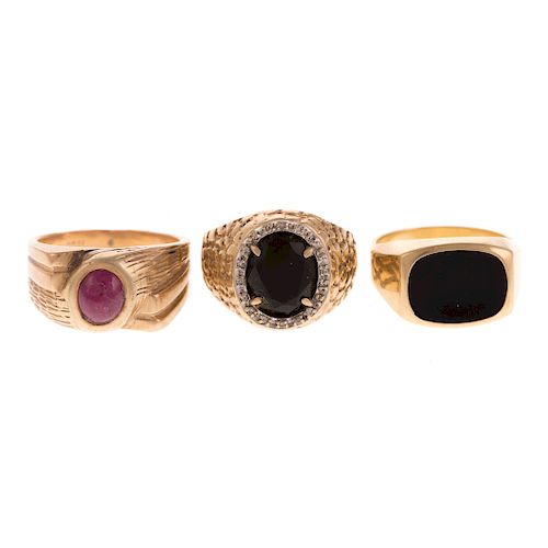 An Trio of Gent's Gemstone Rings in Gold