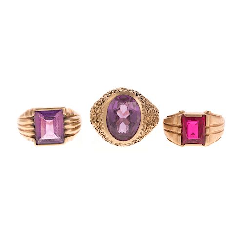 A Trio of Gent's Gemstone Rings in Gold