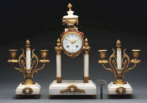Three Piece French Onyx and Gilt Metal Clock Set.