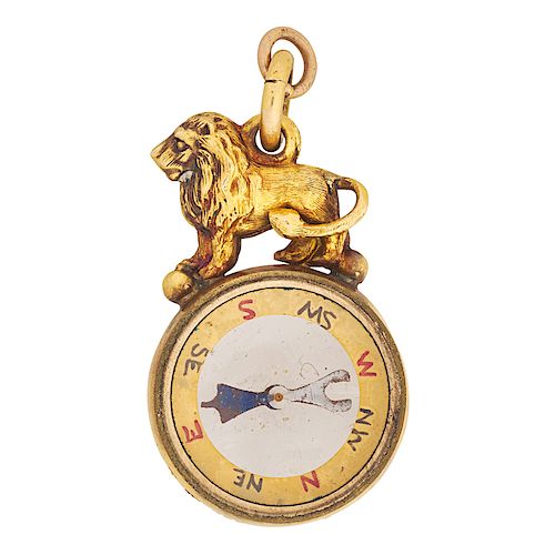 EARLY 20TH C. ENGLISH YELLOW GOLD LION COMPASS
