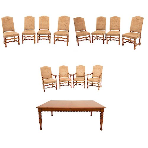 Comedor. Siglo XX. Elaborado en madera tallada. Mesa. Cubierta rectangular, sistema de extensiones, 8 sillas y 4 sillones.Pzs: 13