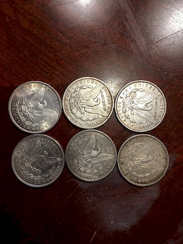 Six Old Silver Dollar Coins, 1878, 1879,1886, 1898,1921