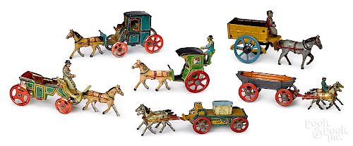 Six tin lithograph horse drawn penny toys