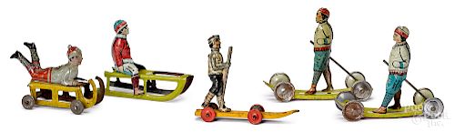 Five tin lithograph penny toys