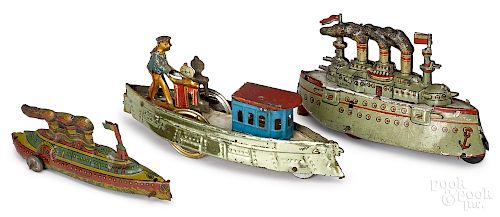 Three tin lithograph boat penny toys