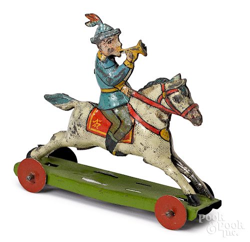 Meier boy on horse with trumpet penny toy