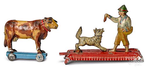 Two tin lithograph penny toys
