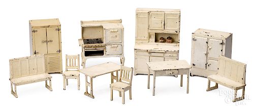 Ten Arcade cast iron pieces of dollhouse furniture