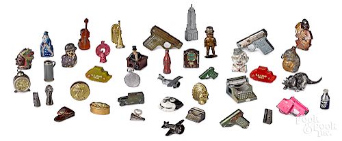 Approximately forty figural pencil sharpeners