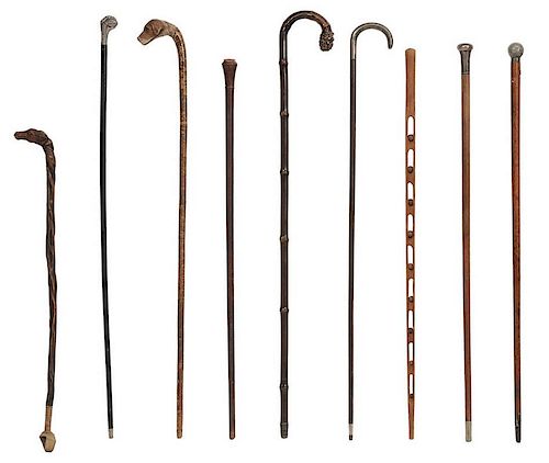 Eight Carved and Cast Metal Canes