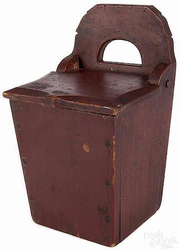 Painted pine hanging salt box, 19th c., retaining a red surface, 10 1/2'' h., 6 1/2'' w.