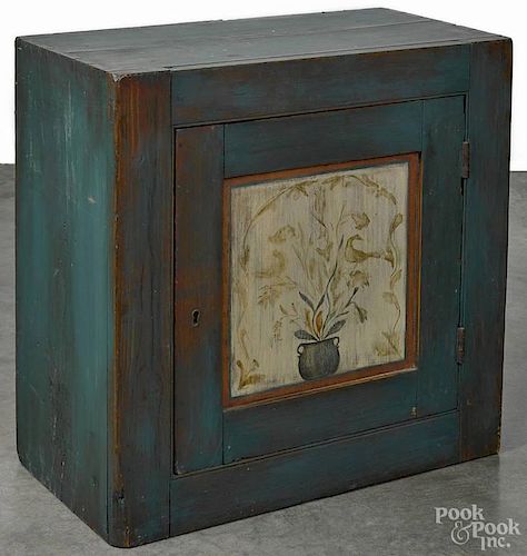 Painted pine hanging cupboard, 19th c., with a later decorated surface, 21 1/4'' h., 21 1/4'' w.