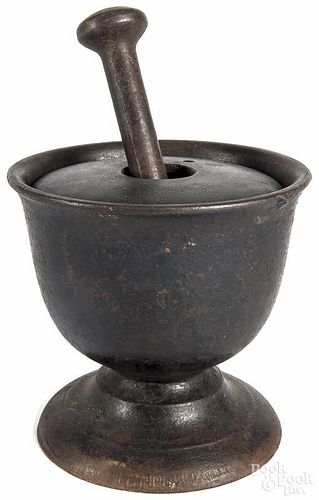 Cast iron mortar and pestle, 19th c., 10 1/2'' h.
