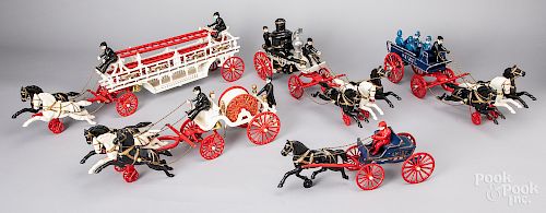 Five reproduction horse drawn fire wagons
