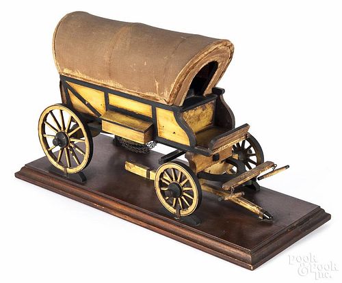 Carved and painted wood Conestoga wagon, early 20th c., 9'' h., 15'' w.