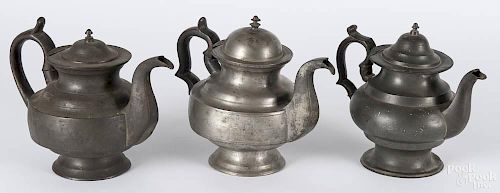 Three Philadelphia, Pennsylvania pewter teapots, 19th c., to include two pieces