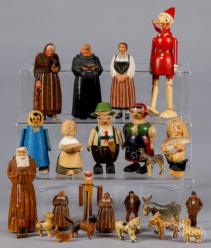 Collection of ramp walkers and carved figures