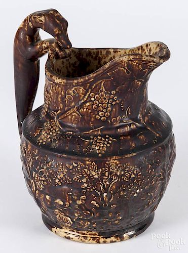 Bennington pottery hunt scene pitcher with a figural hound handle, 10'' h.