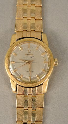 Omega Seamaster automatic chronometer 18 karat mens wristwatch with 14 karat gold band. lg. 7 1/4 in., 72.4 grams