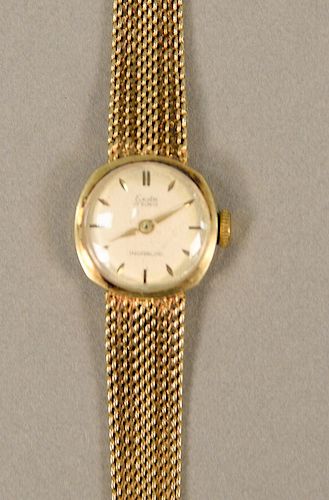Exita Incabloc 14 karat gold ladies wristwatch with 14 karat mesh band. lg. 5 5/8 in., 19.4 grams total weight