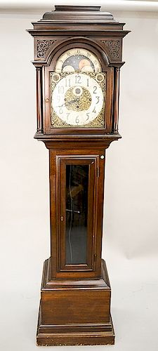 Tiffany & Co. mahogany tall clock, dial with moon phases, five tube with three brass weights, chime, and strike, dial marked: Tiffan...