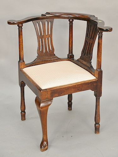 George III style mahogany corner desk chair with pierced back splats, raised on cabriole legs. seat ht. 18 in. Provenance: From the ...