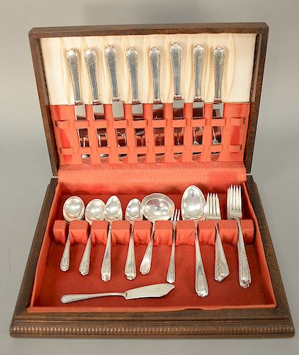 Sterling silver flatware set, setting for eight. 49.3 troy ounces plus 8 handles