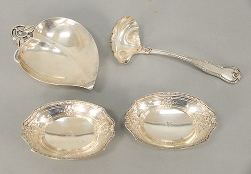 Tiffany & Co. sterling silver four piece lot to include ladle, leaf dish, and two large salts. 12.3 troy ounces