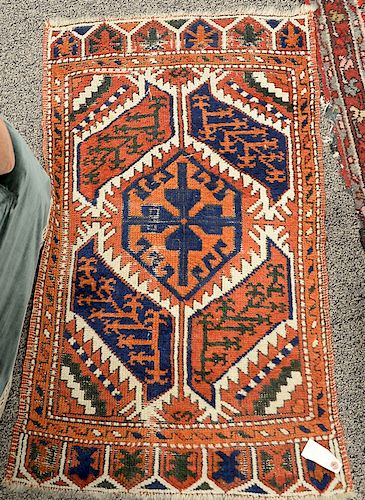 Two piece lot to include a Hamaden Oriental runner (2'6" x 9'6") and a throw rug (2' x 3'3").