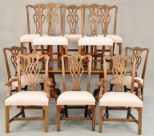 Henredon eleven piece dining set to include ten Chippendale style chairs and a double pedestal table with ball and claw feet, two 24...