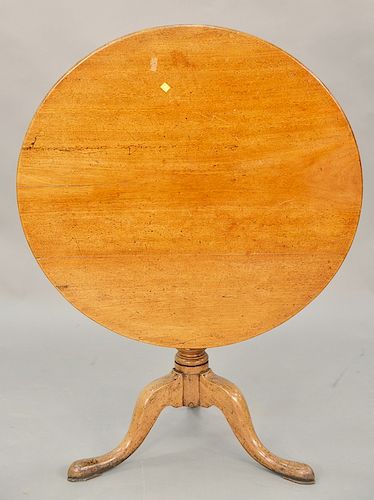 George III style mahogany tripod table, circular top raised on turned standard continuing to scrolled legs, 19th century. ht. 28 1/2...