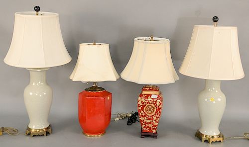 Four ceramic table lamps including two red and two celadon crackle glazed. Provenance: From the Estate of Deborah G. Black of Greenw...