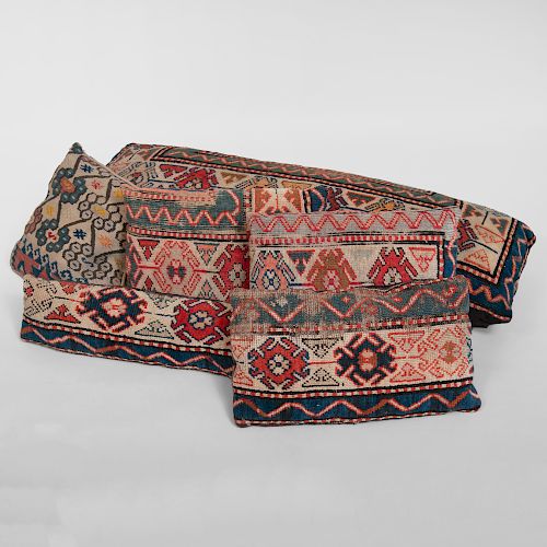 Group of Six Pillows Covered in Carpet Fragments