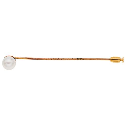 A cultured pearl 14K yellow gold stick pin.