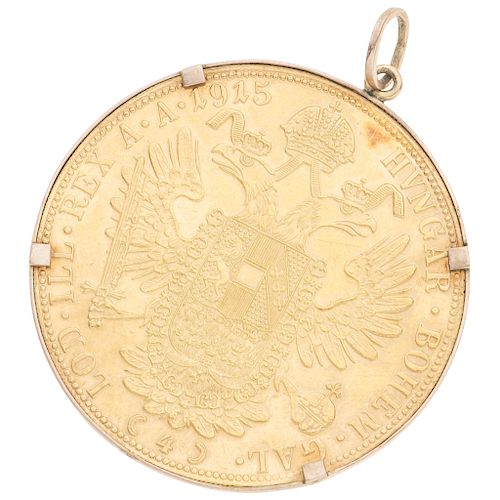 An 10K yellow gold pendant with 14K yellow gold coin.